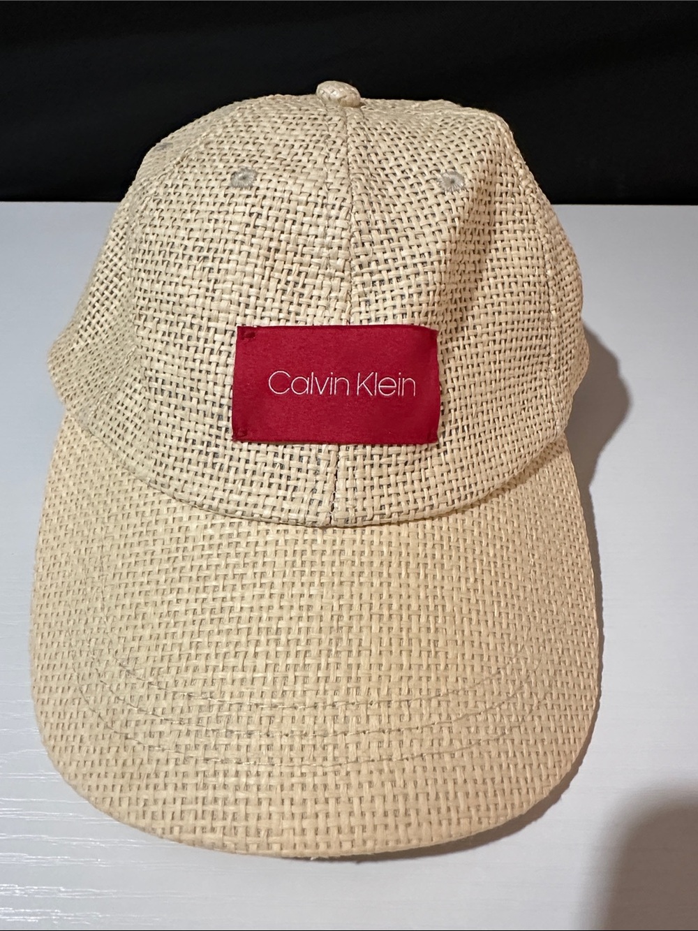 Women’s Calvin Klein Natural Woven Cap with Red Logo Patch